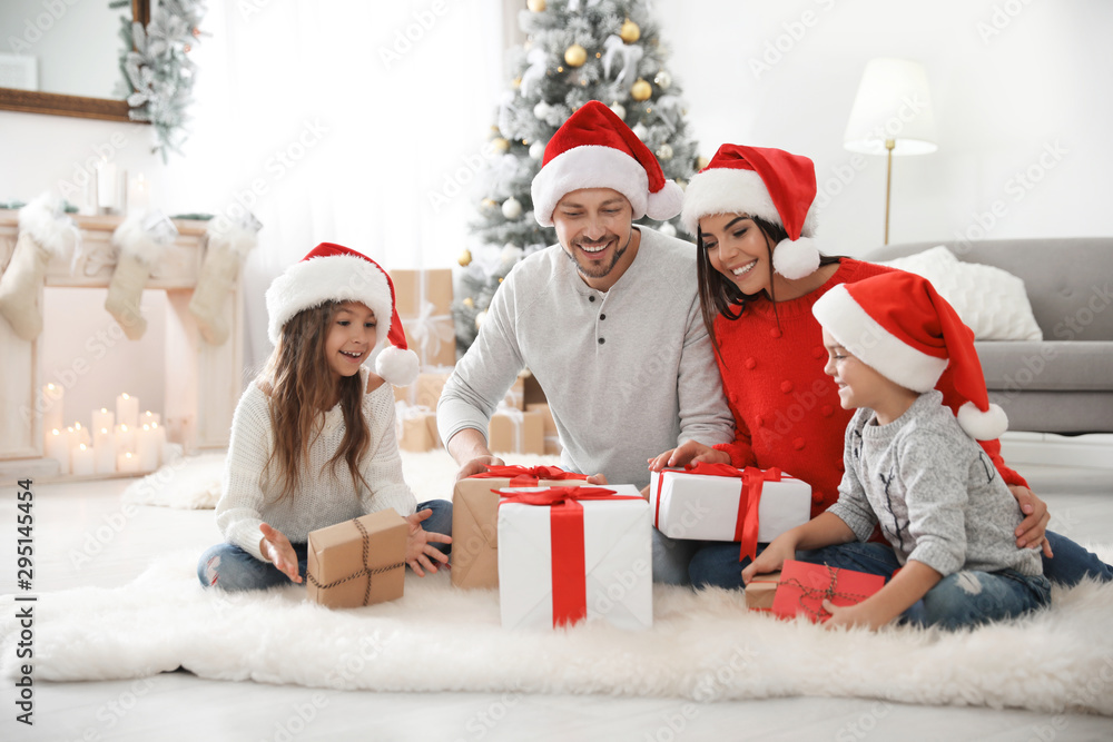 Sticker happy family with children and christmas gifts on floor at home