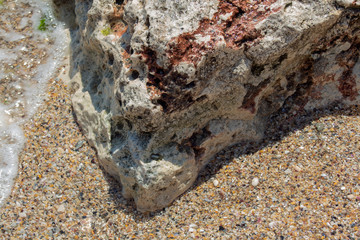 An interesting colored stone cliff on the seashore. Rusalka (Mermaid) Resort, Black Sea, Bulgaria.