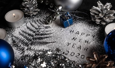 New Year 2020 background. Silhouette of flour on blackbackground