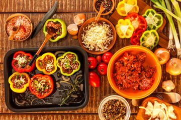 Colorful baked with cheese, stuffed peppers with minced meat. Top view. Minced meat and vegetables