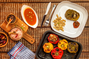 Colorful baked with cheese, stuffed peppers with minced meat. Top view. Minced meat and vegetables