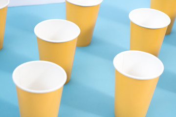 symmetrical glasses with blue background