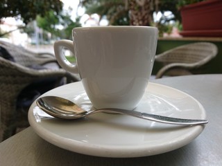 cup of coffee on wooden table