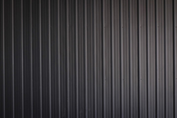 metal texture pattern, ribbed cast iron surface, textured black background , wall for dark backdrop , loft style interior.
