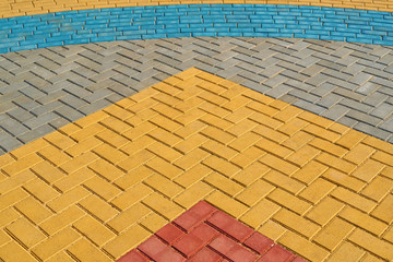 yellow, red and blue paving tiles for background or texture