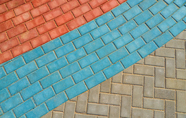 red and blue paving tiles for background or texture