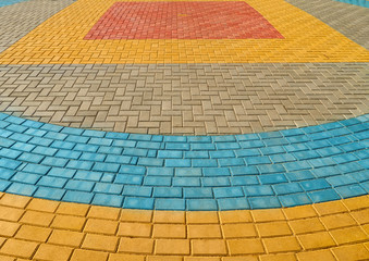 yellow, red and blue paving tiles for background or texture