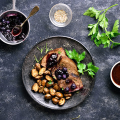 Slow cooked beef with mushrooms and blueberry sauce