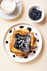 French toasts with blueberry sauce