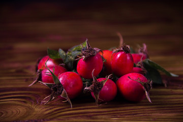 rose hip on a wooden background