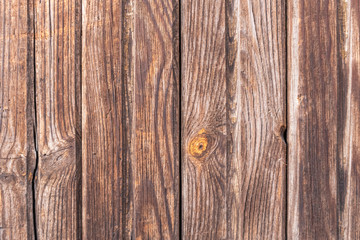 Background from wooden planks with knots. Striped background.