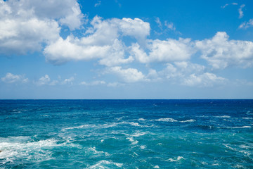 Natural background blue sea with waves, azure clear water beach
