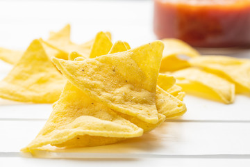 Corn nacho chips. Yellow tortilla chips.