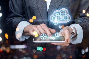 Businesswoman working with cloud data in the phone .