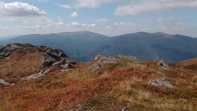 A view of the Mountains from the top of Mount Pikui. A view of the stone from the Carpathian Mountains. Autumn landscape