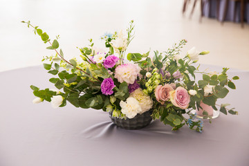 Beautiful bouquet of flowers on the table. Decorations for wedding