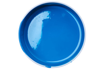 Blue paint in bowl top view isolated on white background