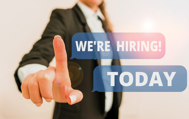 Text sign showing We Are Re Hiring. Business photo text process of reviewing applications and finding candidates Digital business in black suite concept with business woman