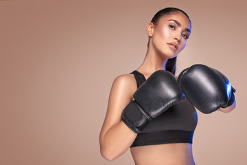 Sexy woman in boxing gloves.