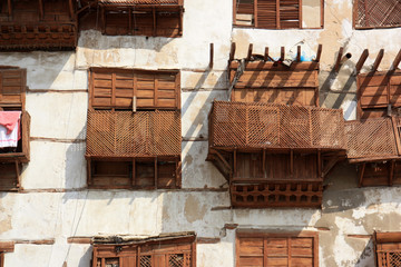 Balconies on a coral house in the residential area within the historic district (Al Balad) in...
