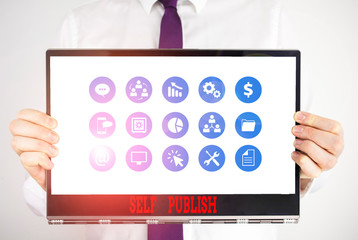 Handwriting text Self Publish. Conceptual photo published their work independently and at their own expense Male human holding thick textured cardboard of business promotion concept