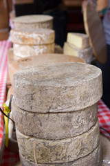 Craft yellow cheese on board