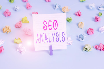 Conceptual hand writing showing Seo Analysis. Concept meaning tool helps showing to study on how to improve a website ranking Colored crumpled papers empty reminder blue floor clothespin