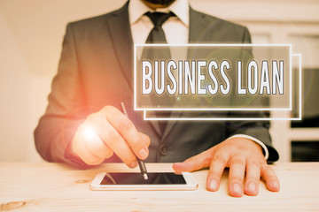 Handwriting text writing Business Loan. Conceptual photo Credit Mortgage Financial Assistance Cash...