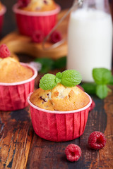 Muffins with raspberries. Delicious homemade sweet dessert. Coffee break