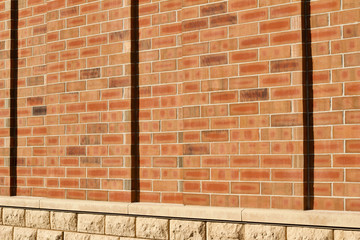 Orange color brick wall texture with 1/3 offset stagger brickwork pattern