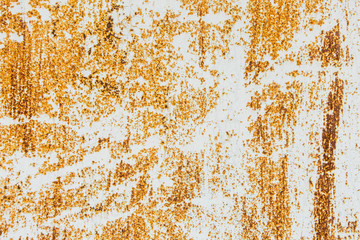 Rusty orange texture on the wall.