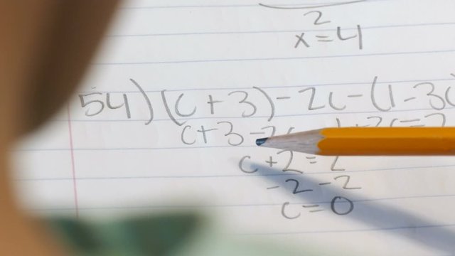 4K: Teen Girl Doing Algebra Homework