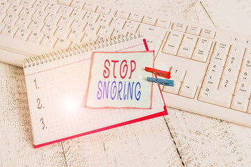Conceptual hand writing showing Stop Snoring. Concept meaning noisy breathing during sleep due to...