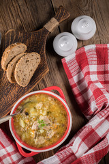 Barley soup with vegetables and chicken.