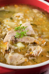 Barley soup with vegetables and chicken.