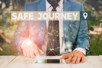 Word writing text Safe Journey. Business photo showcasing polite way of wishing someone a safe journey or Safe Travel Male human wear formal work suit presenting presentation using smart device