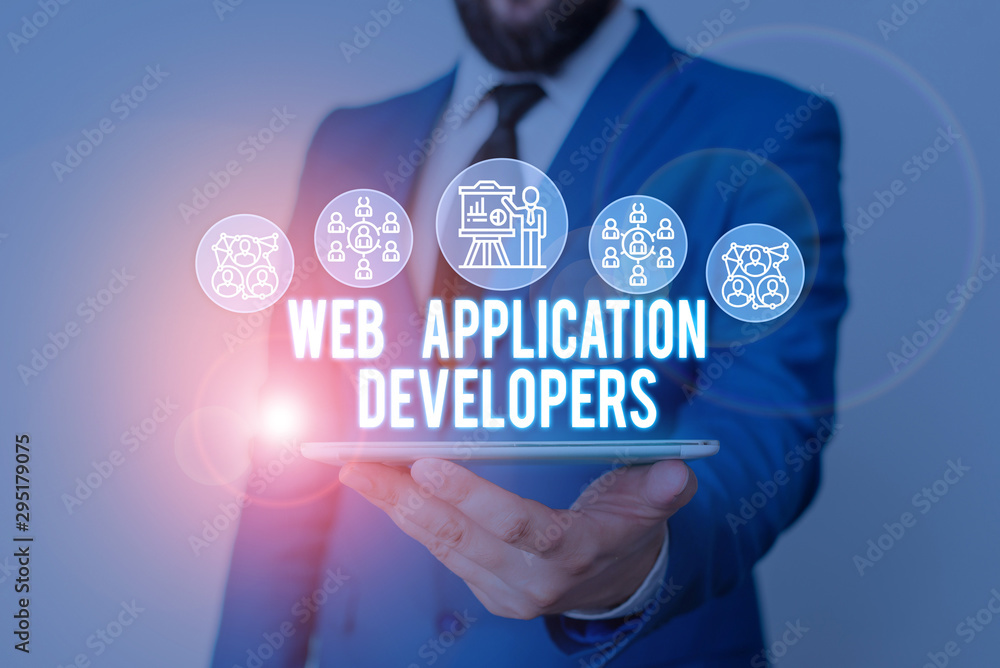 Poster Handwriting text writing Web Application Developers. Conceptual photo Internet programming experts Technology software Male human wear formal work suit presenting presentation using smart device