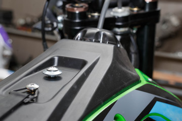 Gas tank cross motorcycle close-up. Build a motorcycle in the service.