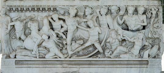 Ancient stone sarcophagus with battle scenes at the entrance of the Archaeological Museum of...