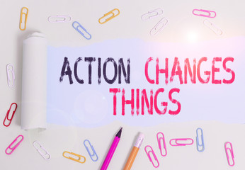Conceptual hand writing showing Action Changes Things. Concept meaning doing something will reflect other things Reaction