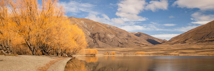 Fototapeta na wymiar Lake in mountains, autumn color, fall landscape