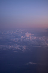 Fototapeta premium The sky with clouds from a flight