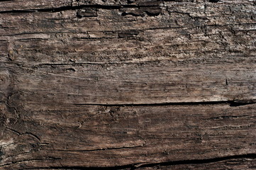 Natural knotted brown weathered wood plank texture