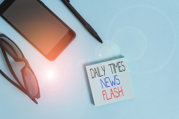 Handwriting text writing Daily Times News Flash. Conceptual photo fast response to actions happened in article way Eyeglasses colored sticky note smartphone cell pen cool pastel background - Powered by Adobe
