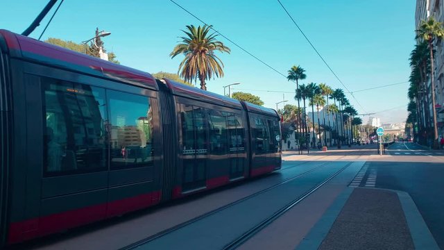 Casablanca, Morocco - 9 October 2019 : view of tram passing on railways  - City scape - Casablanca tramway 