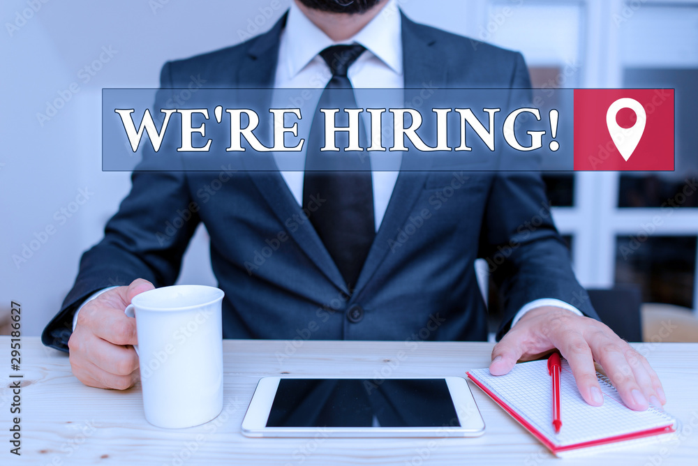 Poster writing note showing we are re hiring. business concept for process of reviewing applications and fi