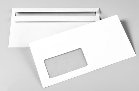 Two Blank Envelopes over Grey Background