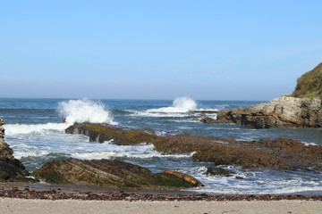 waves crashing on rocks