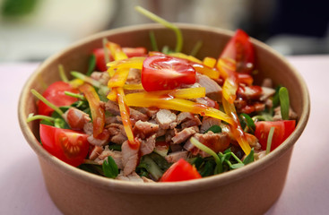 Chicken salad with vegetables and mixed greens. Delicious healthy eating.