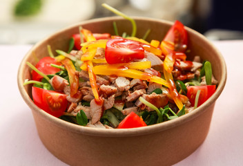 Chicken salad with vegetables and mixed greens. Delicious healthy eating.